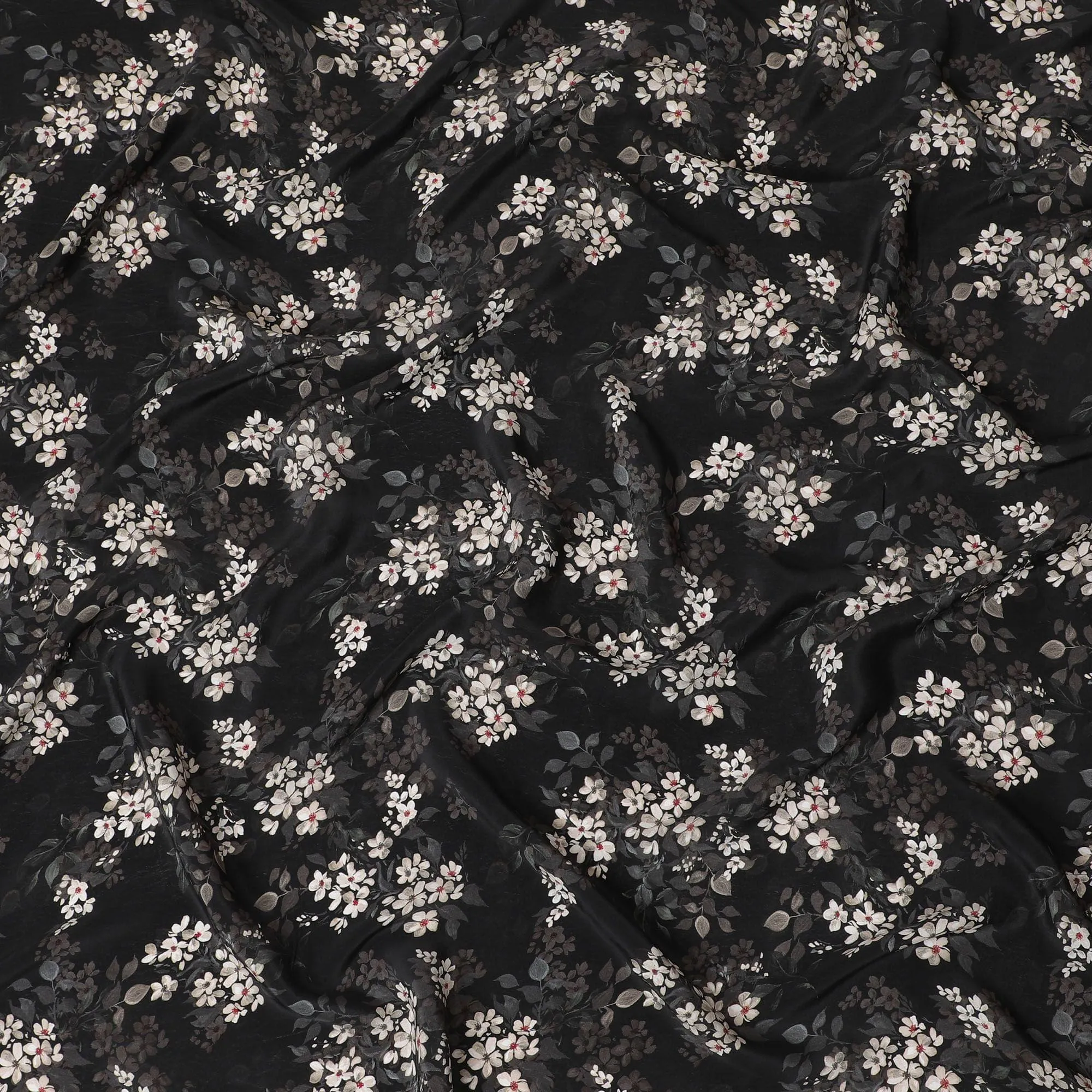 Black synthetic crepe fabric with white, light green and red digital prints in floral design-D15771