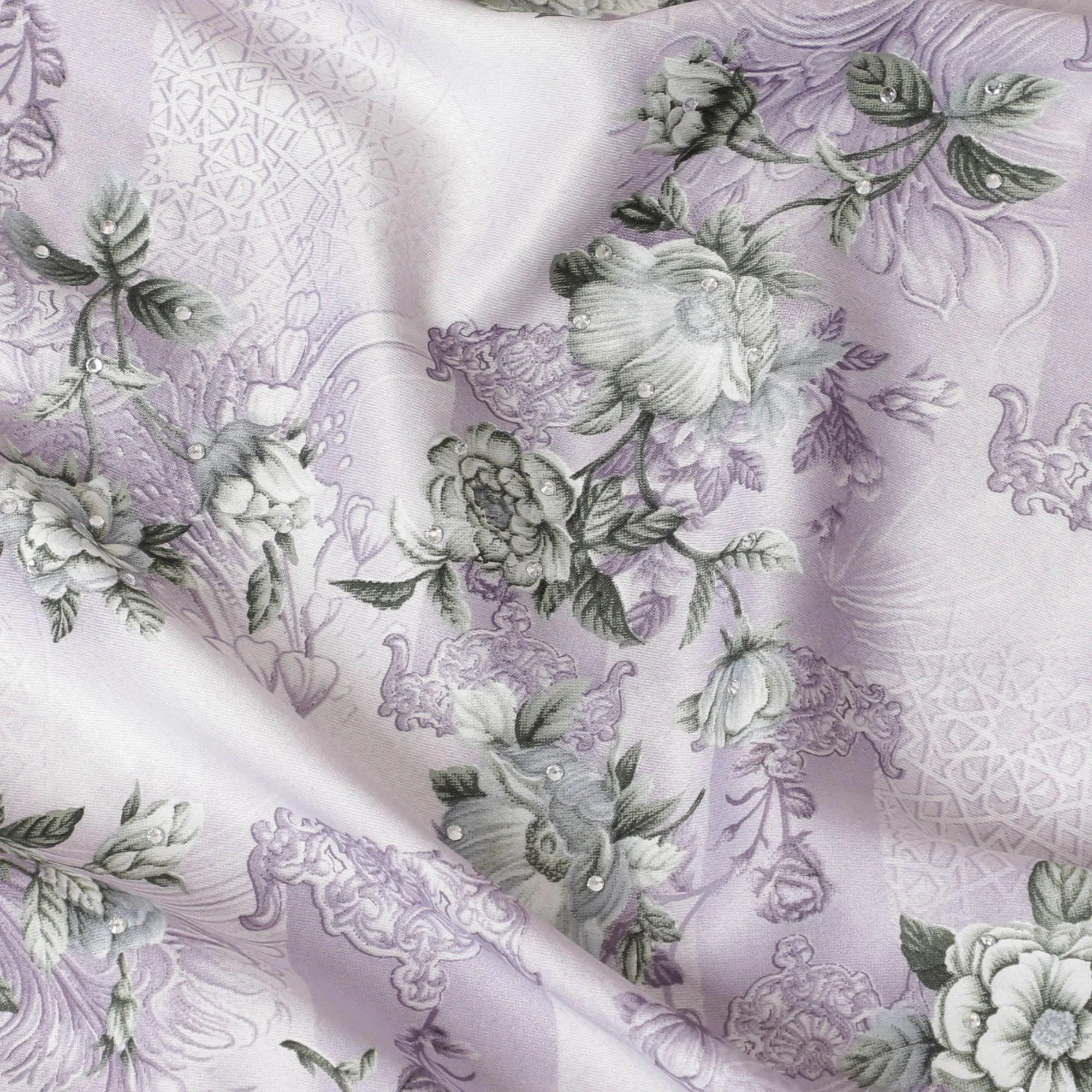 Off white synthetic crepe fabric with light lilac and turquoise green print having stone work in floral design-D15306