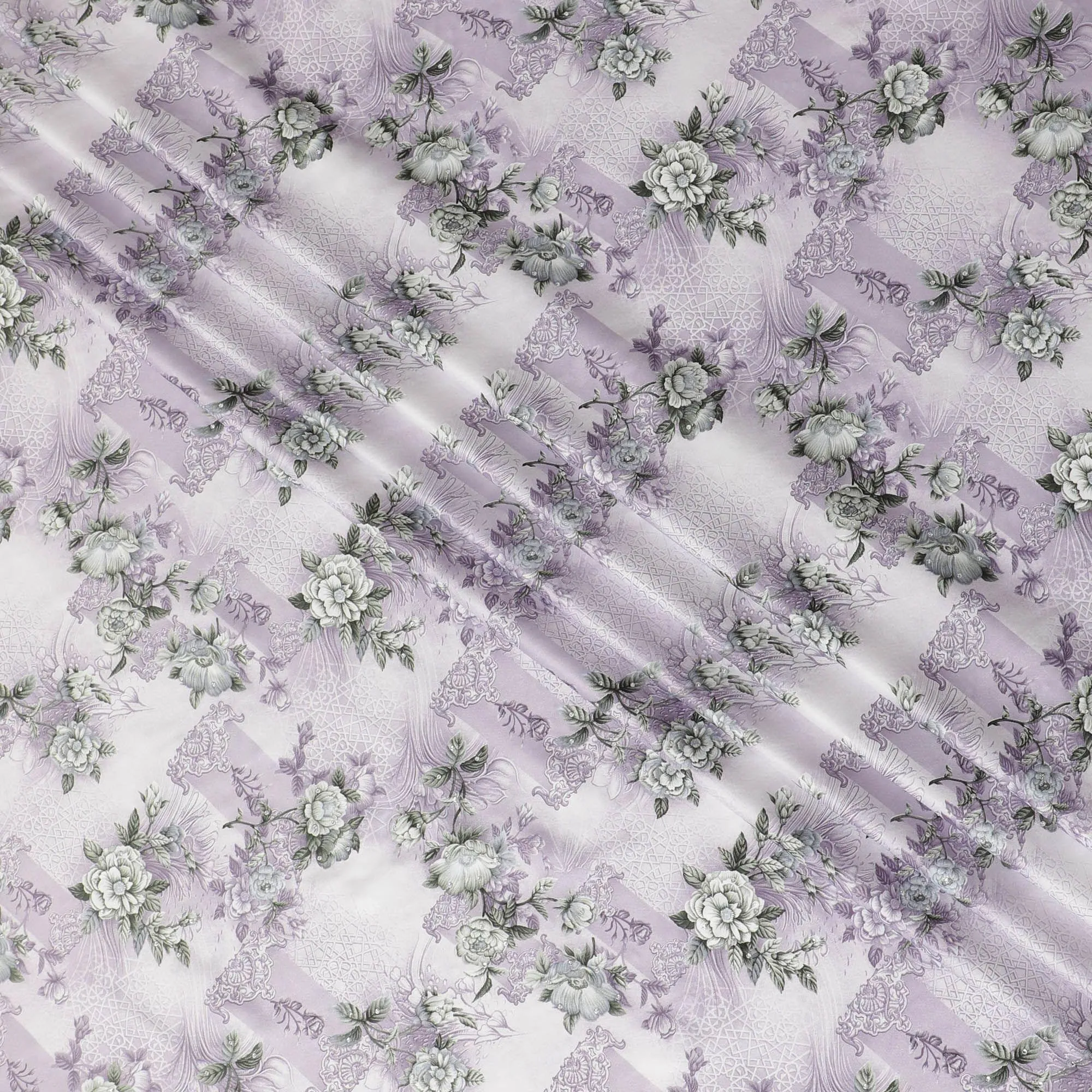 Off white synthetic crepe fabric with light lilac and turquoise green print having stone work in floral design-D15306