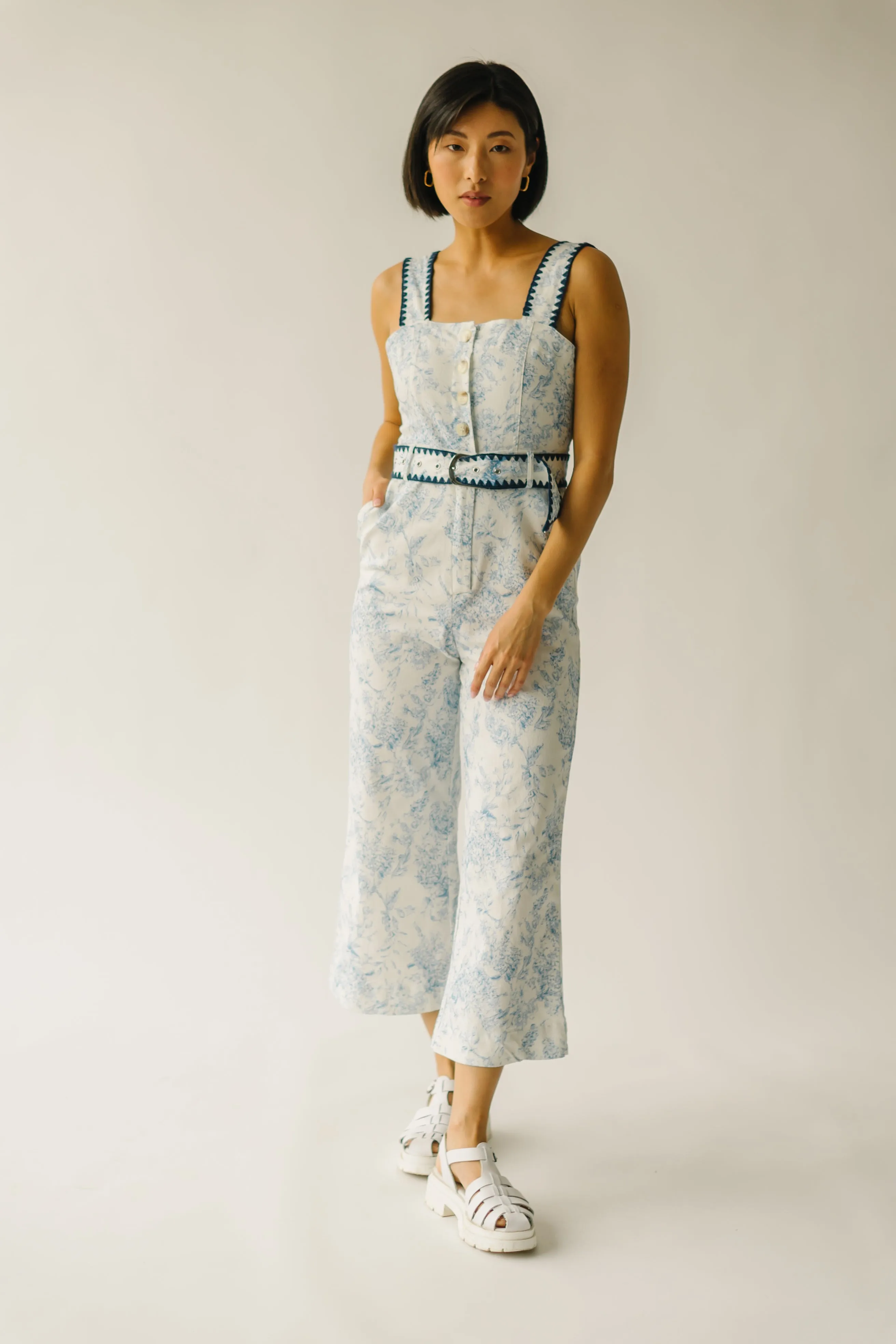 The Almada Belted Floral Jumpsuit in Ivory   Blue