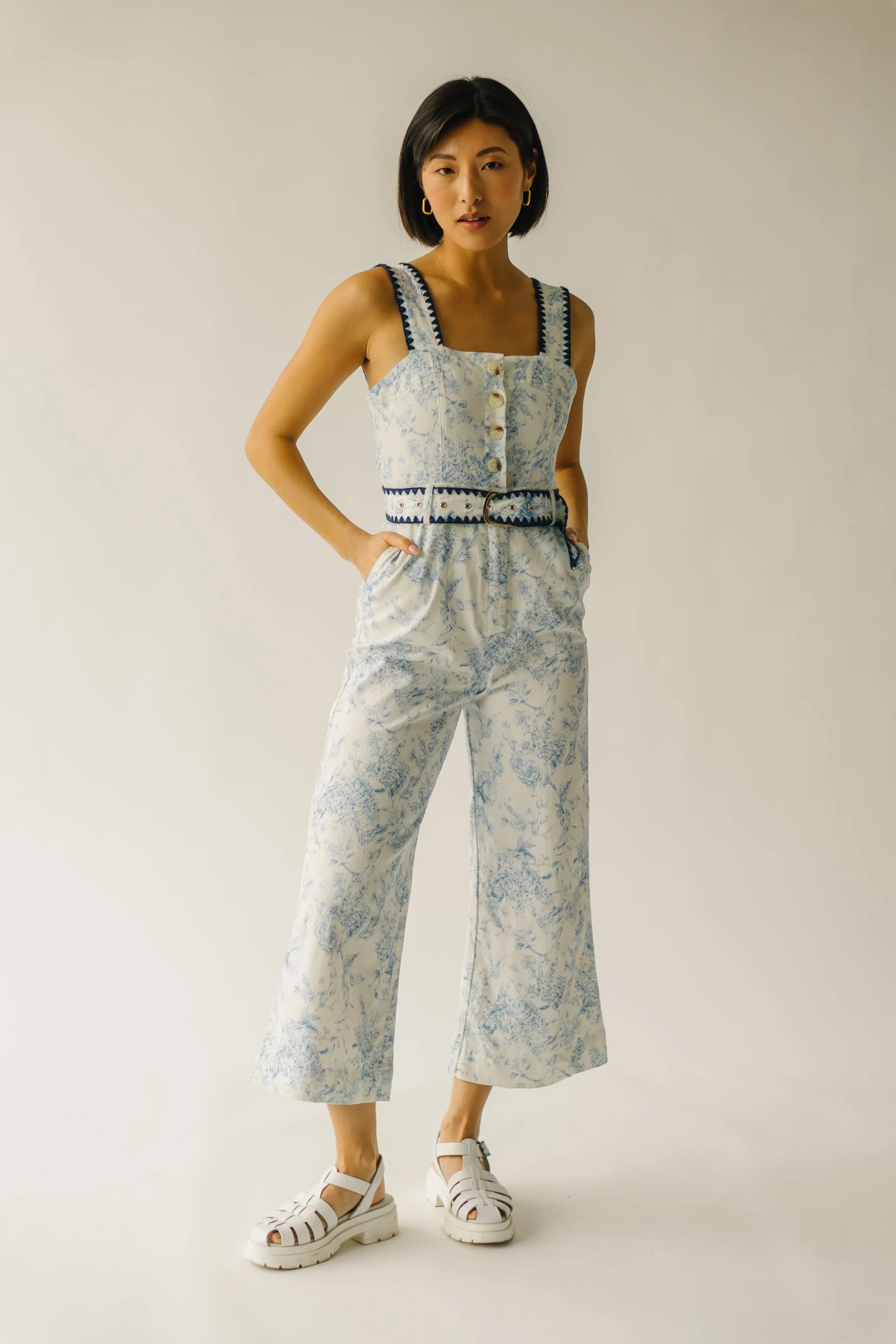 The Almada Belted Floral Jumpsuit in Ivory   Blue